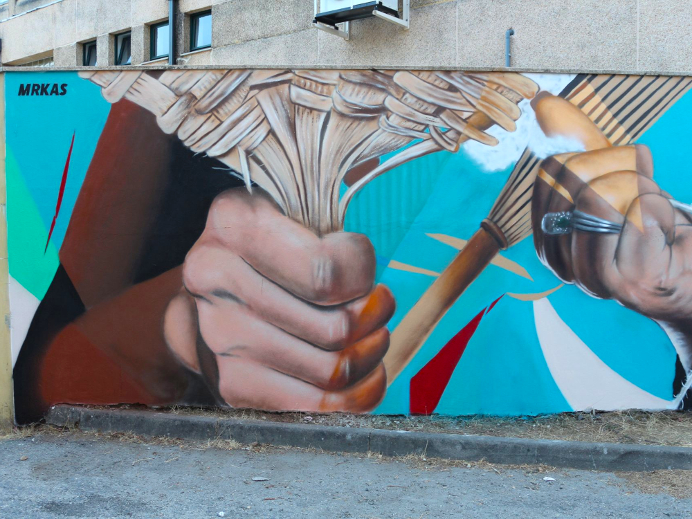 Grafite alusivo aos ofícios e tradições para apreciar no Mercado Municipal